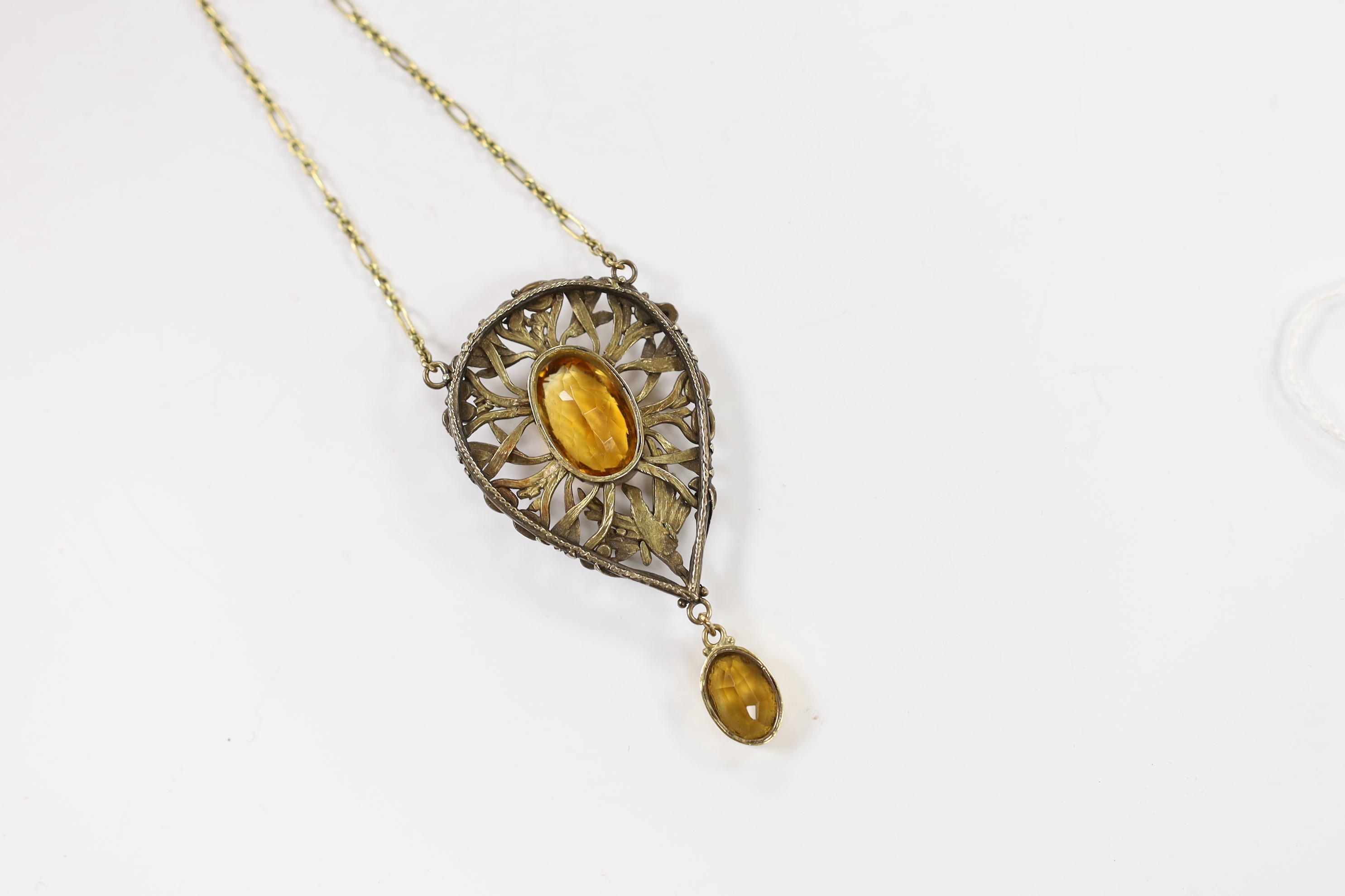 A yellow metal, white metal and two stone citrine set drop pendant necklace, with citrine set clasp, 58cm.